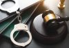 The Wild East: Florida’s Most Dangerous Cities handcuffs wooden gavel crime violence concept